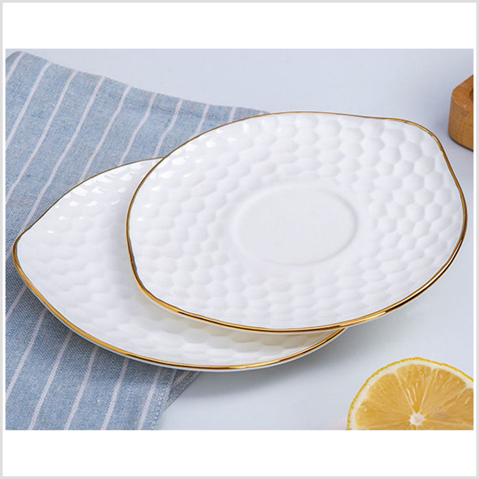 Bone China Tea Cup & Saucer - Gold Rimmed on Golf Shaped Surface