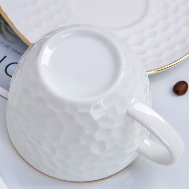 Bone China Tea Cup & Saucer - Gold Rimmed on Golf Shaped Surface