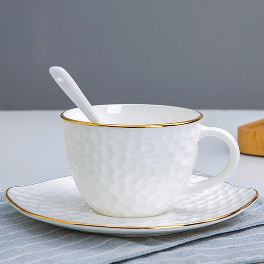 Bone China Tea Cup & Saucer - Gold Rimmed on Golf Shaped Surface